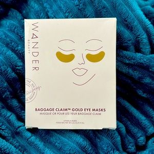 Wander Beauty. Baggage claim gold eye masks.